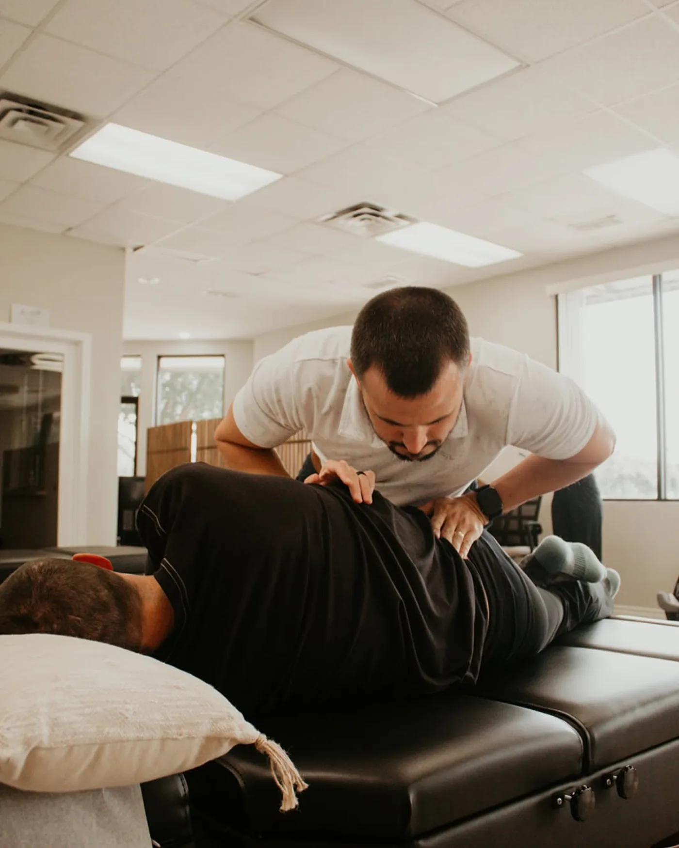Adult spinal adjustment at Trinity Life
